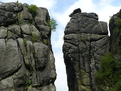 rock cliff under blue sky thumbnail