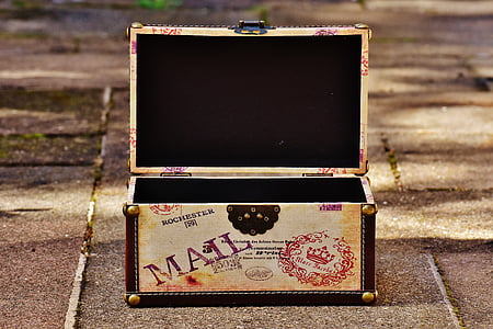 beige and black wooden chest box on floor thumbnail
