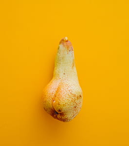 yellow vegetable on orange surface thumbnail