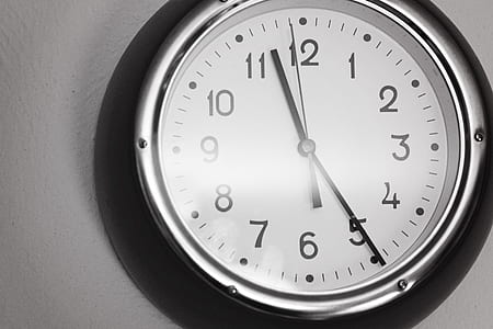 round gray stainless steel analog watch displaying 11:25 thumbnail