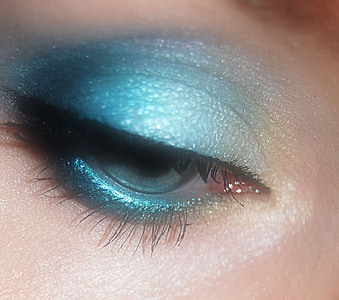 closeup photo of person's blue eyeshadow thumbnail