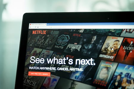 Watch movies!  Netflix app on Laptop screen thumbnail