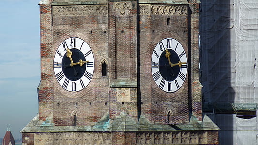 brown and white analog clock thumbnail
