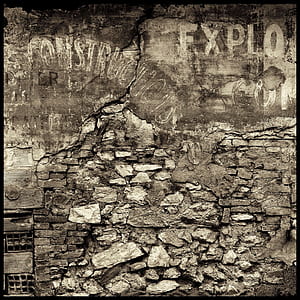 photo of gray and brown stone wall at daytime thumbnail