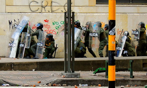 policemen group near on concrete pavement thumbnail