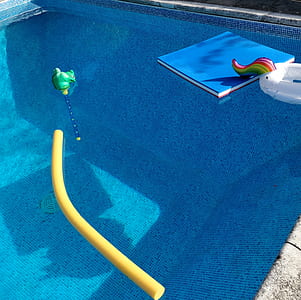 photo of white inflatable floater on swimming pool thumbnail