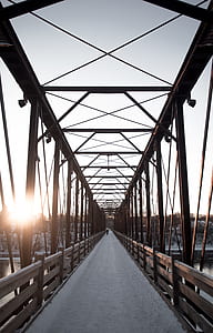 gray concrete suspension bridge under white sky thumbnail