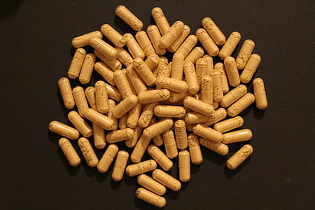 oval white capsule medicines thumbnail