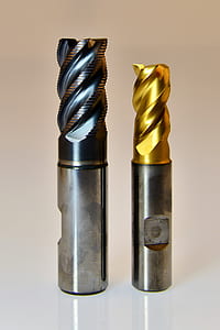 selective focus photography of two drill bits thumbnail