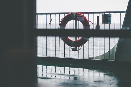 photo of orange floater ring on railings thumbnail