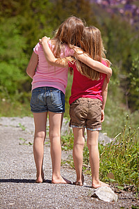 two girl's wearing pick shirts thumbnail