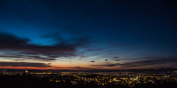 aerial view of the city during night time thumbnail