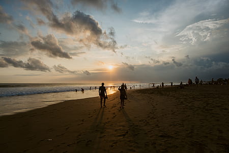 group of people beside body of water thumbnail