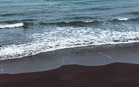 ocean waves on seashore during daytime thumbnail
