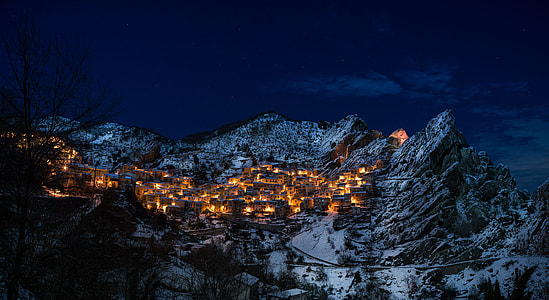 village in the middle of mountains turn-on lights thumbnail