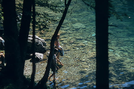 two women on body of water thumbnail