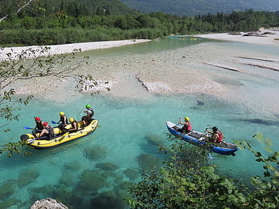 people riding row boats thumbnail
