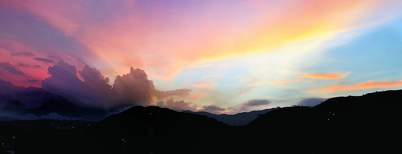 silhouette of mountain under golden hour at daytime thumbnail