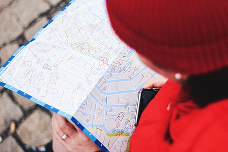 person looking white map thumbnail