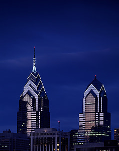 two high-rise buildings during nighttime thumbnail