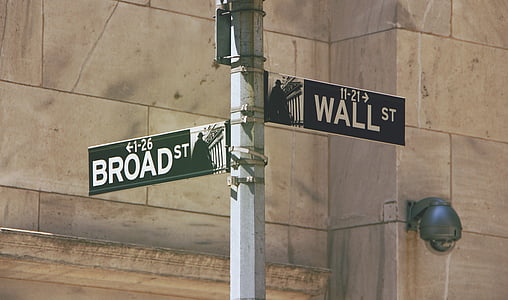 grey post with signage during daytime thumbnail