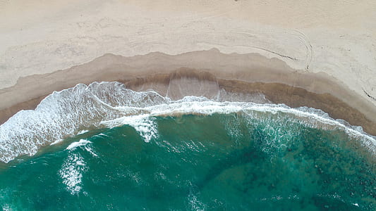 ocean waves at daytime aerial photography thumbnail