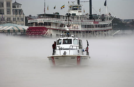 white boat on body of water thumbnail