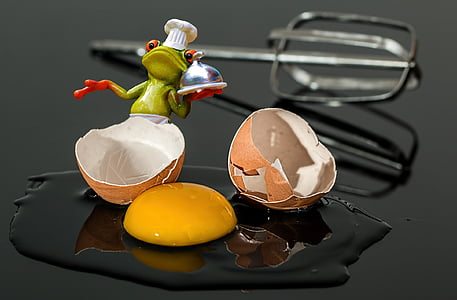 green chef nfrog figurine beside cracked egg thumbnail