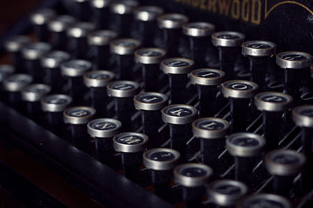 typewriter keys selective focus photo thumbnail