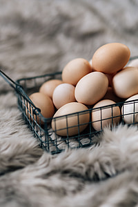 Wire mesh basket with fresh farm eggs thumbnail