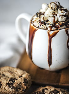 Selective Focus Photography Of Chocolate Dessert Served on White Ceramic Mug thumbnail