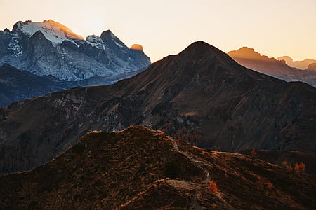 brown and white mountains at sunset thumbnail