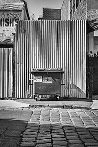 grayscale photo of rolling garbage can thumbnail