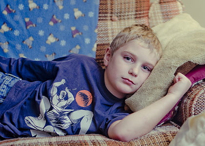 boy lying on sofa thumbnail