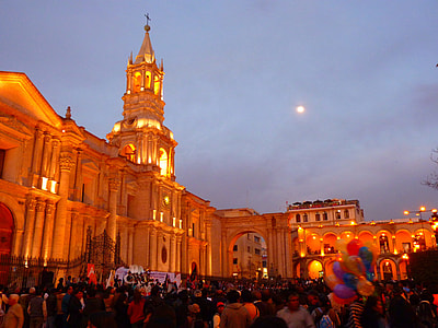 people standing near concrete cathedral during dawn thumbnail
