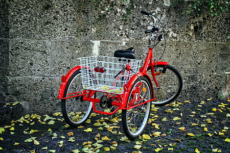 parked red and black trike thumbnail
