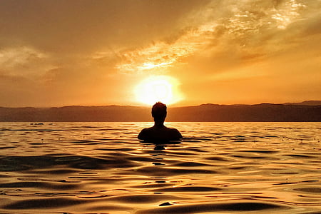 silhouette photography of person swimming thumbnail