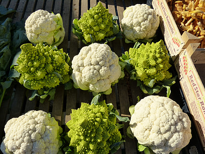 cauliflowers on brown wooden surface thumbnail