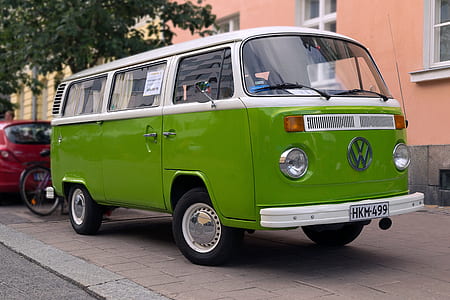 parked green Volkswagen T2 thumbnail