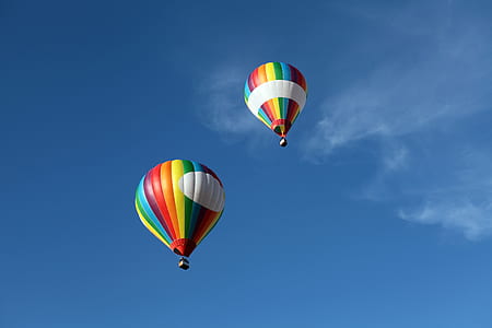 two multicolored striped hot air balloons thumbnail