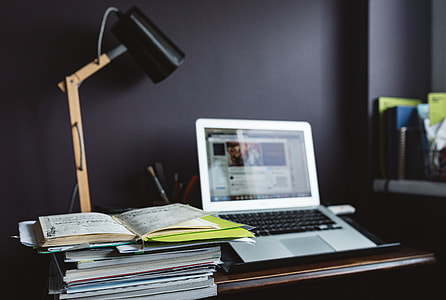 Contemporary home office idea with dark walls thumbnail