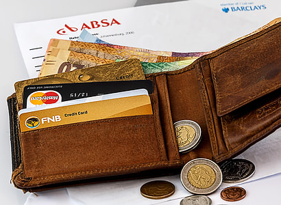 Open Wallet with coins and credit cards thumbnail
