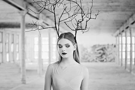 Grayscale Photography Of Woman Wearing Sleeveless Top thumbnail