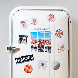assorted stickers on door thumbnail