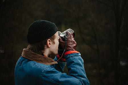 man using camera thumbnail