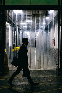 man walking beside air curtain thumbnail