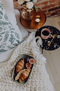 A lovely woman's bedroom with a beautiful bouquet of flowers thumbnail