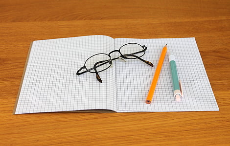 eyeglasses on paper near pencil thumbnail