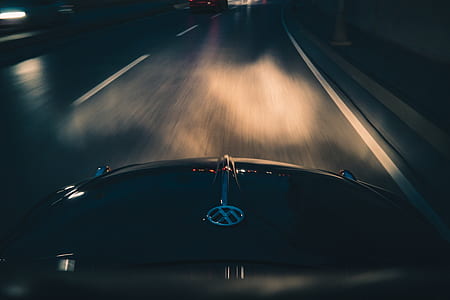 Black Volkswagen Car on Gray Asphalt Road thumbnail