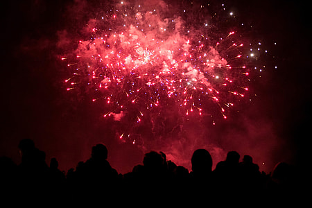 A crowd of people watching the fireworks display thumbnail